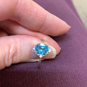 10kt White Gold Blue Topaz w/ 4 round Diamonds
